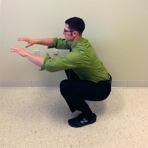 Squat demonstration at Capital Chiropractic
