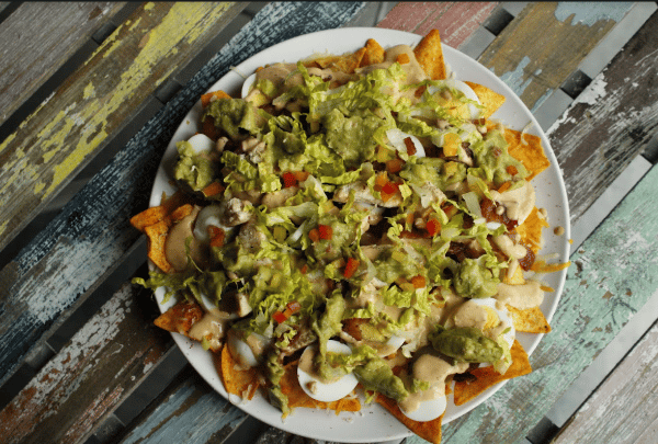 A plate of loaded nachos from The Keto Kitchen